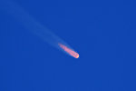 Ракета-носитель Союз-ФГ с пилотируемым кораблем Союз МС-10 после старта со стартового стола первой Гагаринской стартовой площадки космодрома Байконур